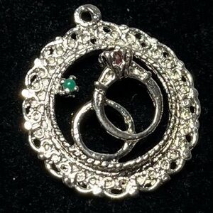 Vintage sterling silver wedding rings charm bracelet pendant. green & red gem